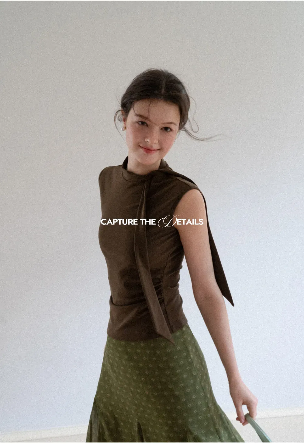 Asymmetrical Tie Neck Sleeveless Top
