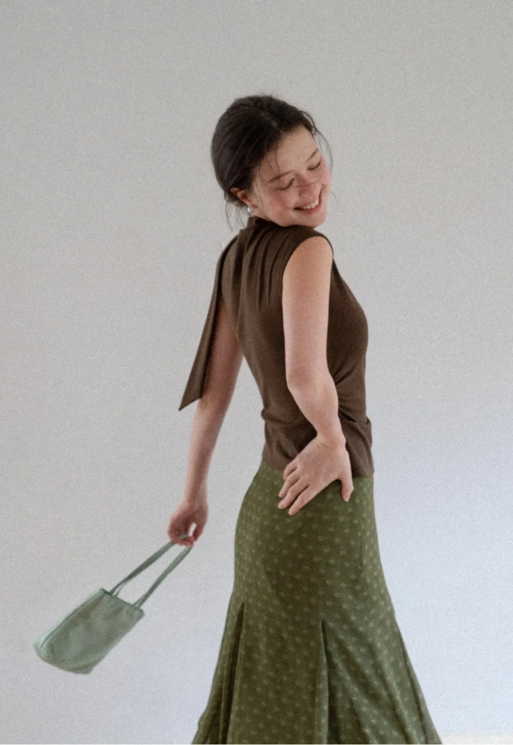 Asymmetrical Tie Neck Sleeveless Top