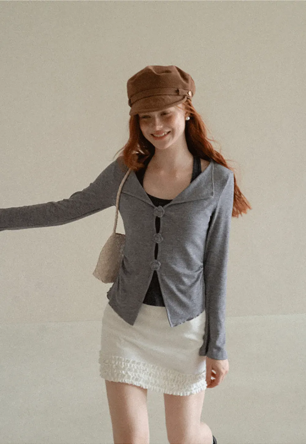 Asymmetrical Hem Knit Cardigan with Floral Buttons