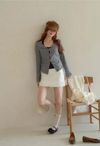 Asymmetrical Hem Knit Cardigan with Floral Buttons