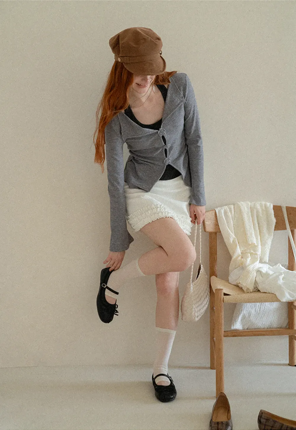Asymmetrical Hem Knit Cardigan with Floral Buttons