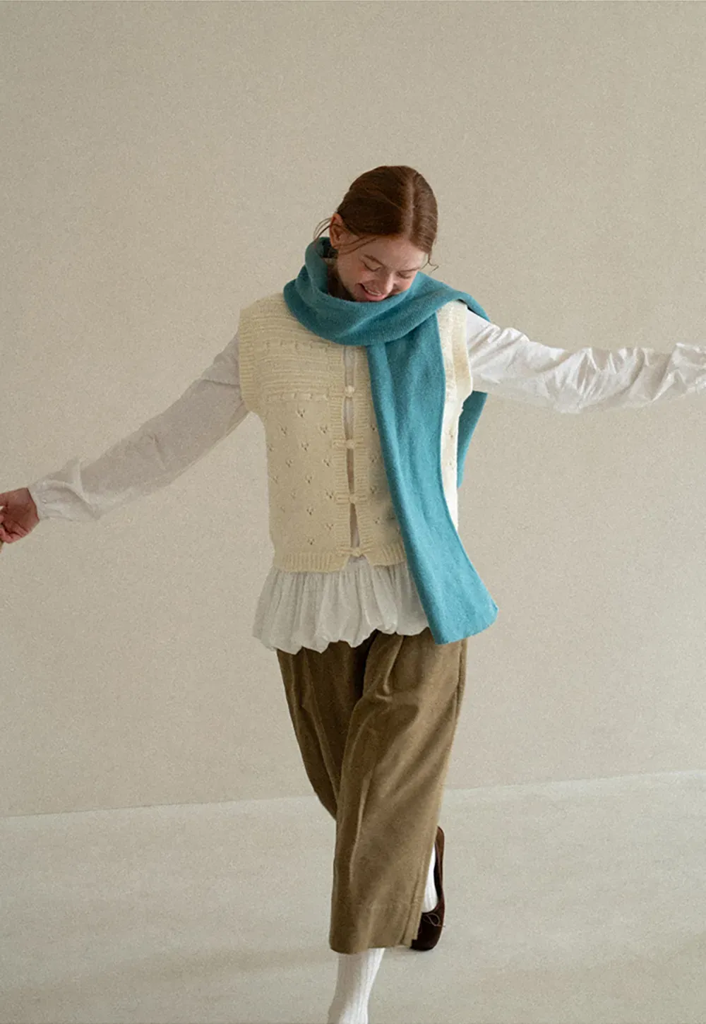 Textured Knit Vest with Peter Pan Collar and Button Closure