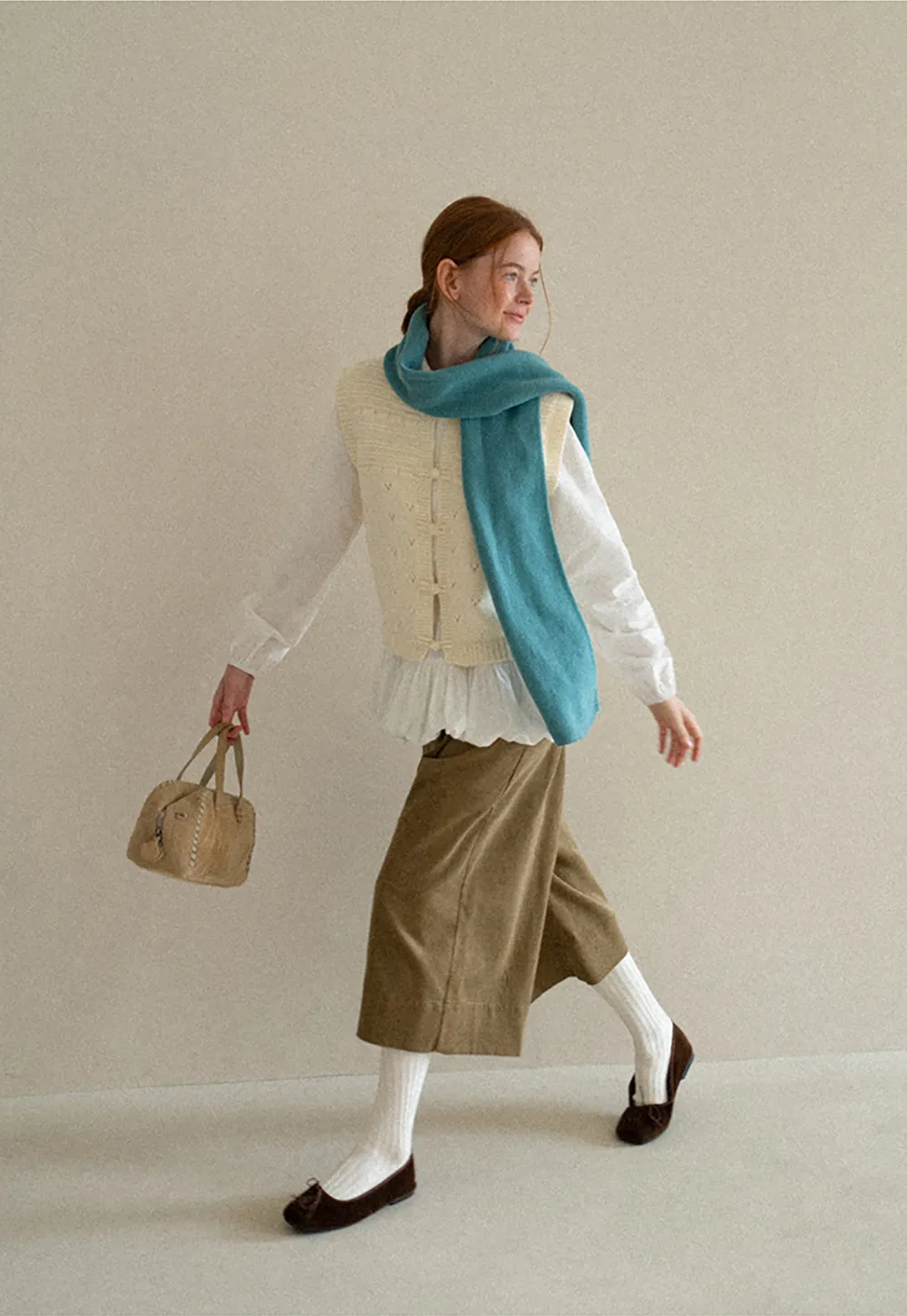 Textured Knit Vest with Peter Pan Collar and Button Closure