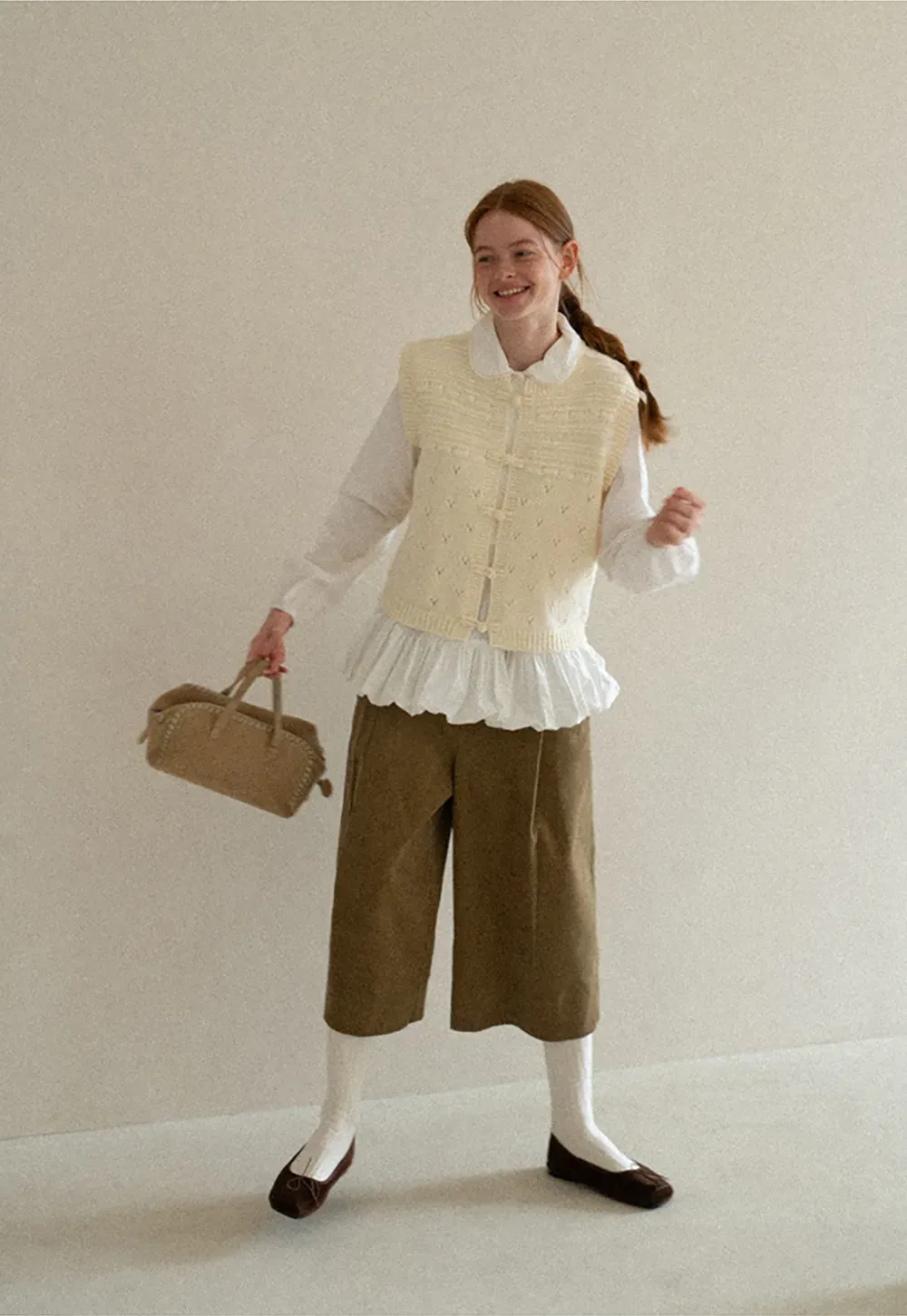 Textured Knit Vest with Peter Pan Collar and Button Closure