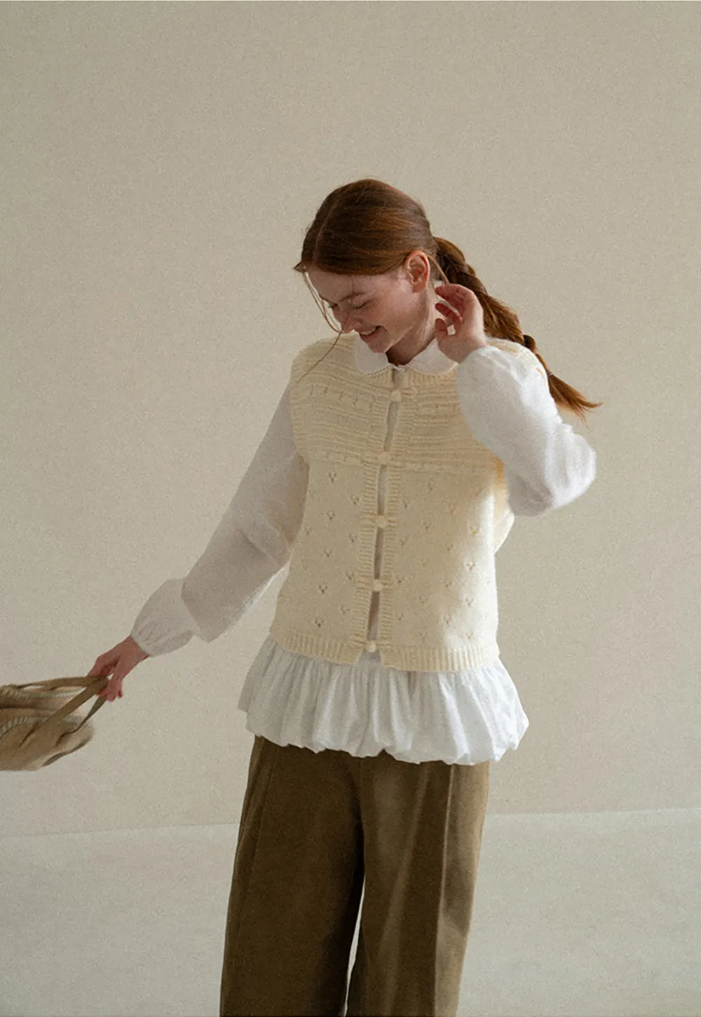Textured Knit Vest with Peter Pan Collar and Button Closure