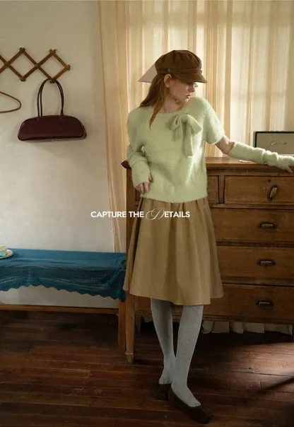 Fuzzy Bow Front Ribbed Turtleneck Sweater