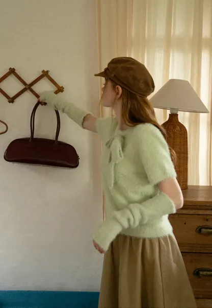 Fuzzy Bow Front Ribbed Turtleneck Sweater