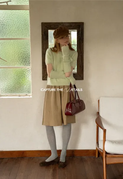 Fuzzy Bow Front Ribbed Turtleneck Sweater