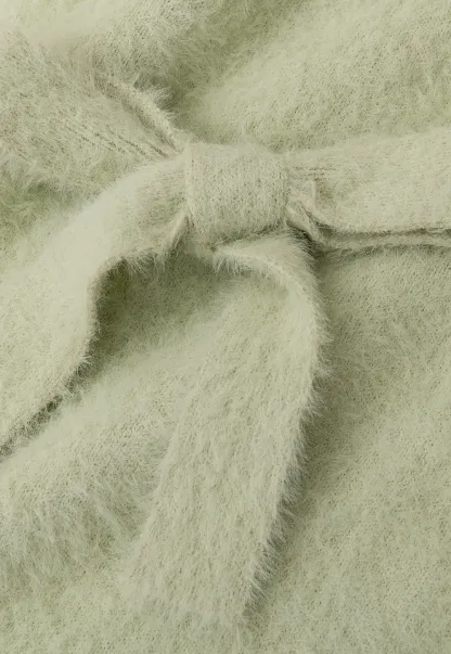 Fuzzy Bow Front Ribbed Turtleneck Sweater