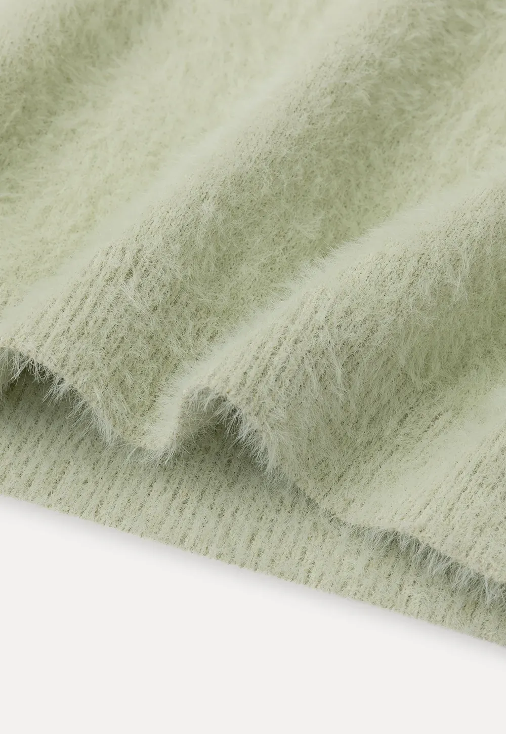 Fuzzy Bow Front Ribbed Turtleneck Sweater