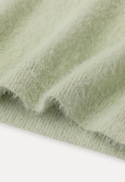Fuzzy Bow Front Ribbed Turtleneck Sweater
