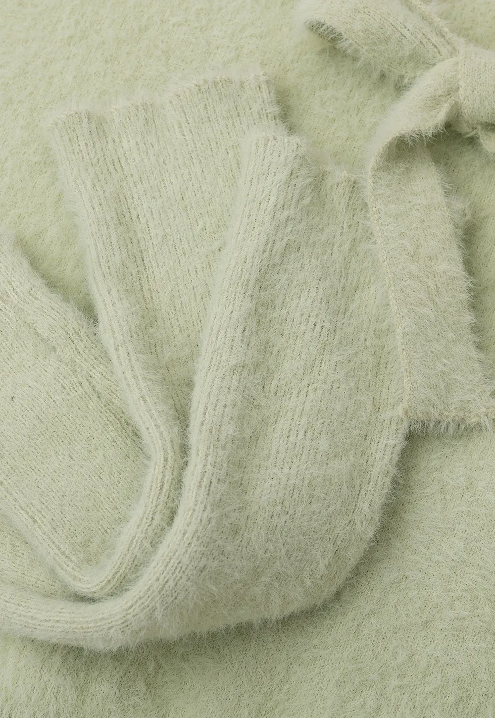 Fuzzy Bow Front Ribbed Turtleneck Sweater