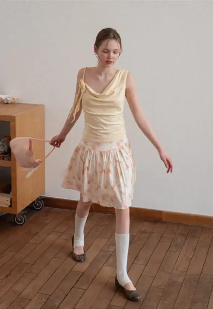 Asymmetrical draped tank top with tie detail