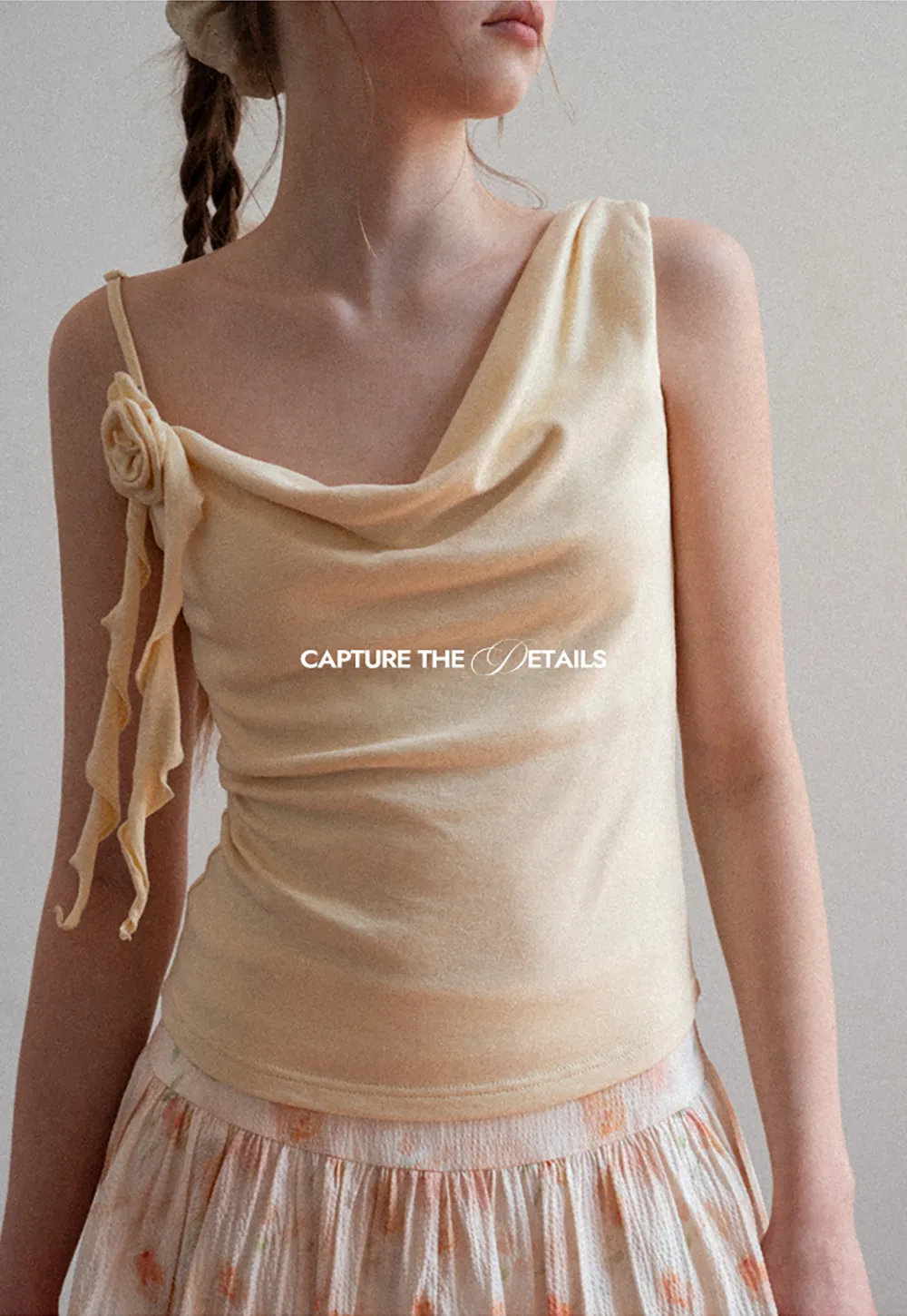 Asymmetrical draped tank top with tie detail