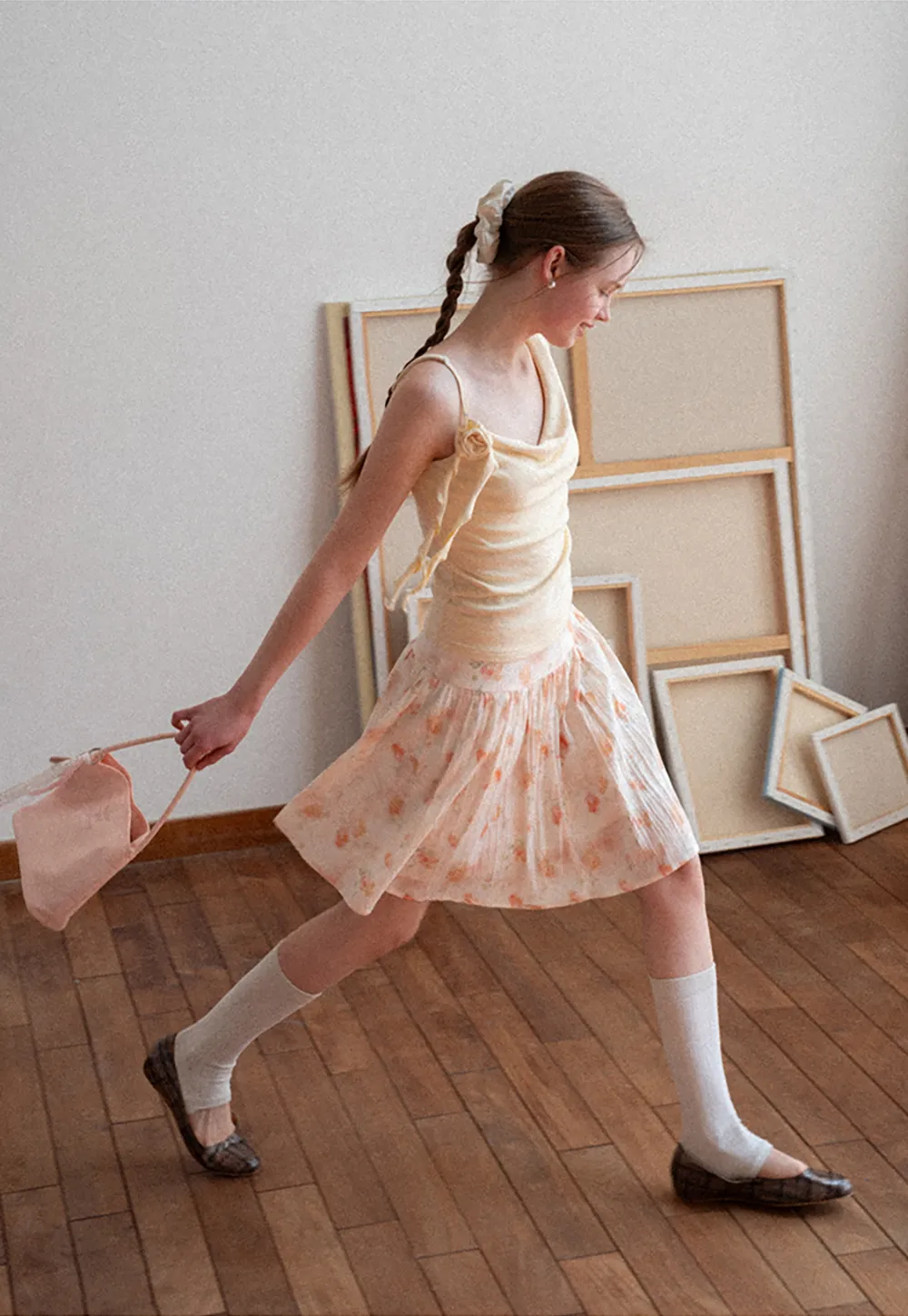 Asymmetrical draped tank top with tie detail