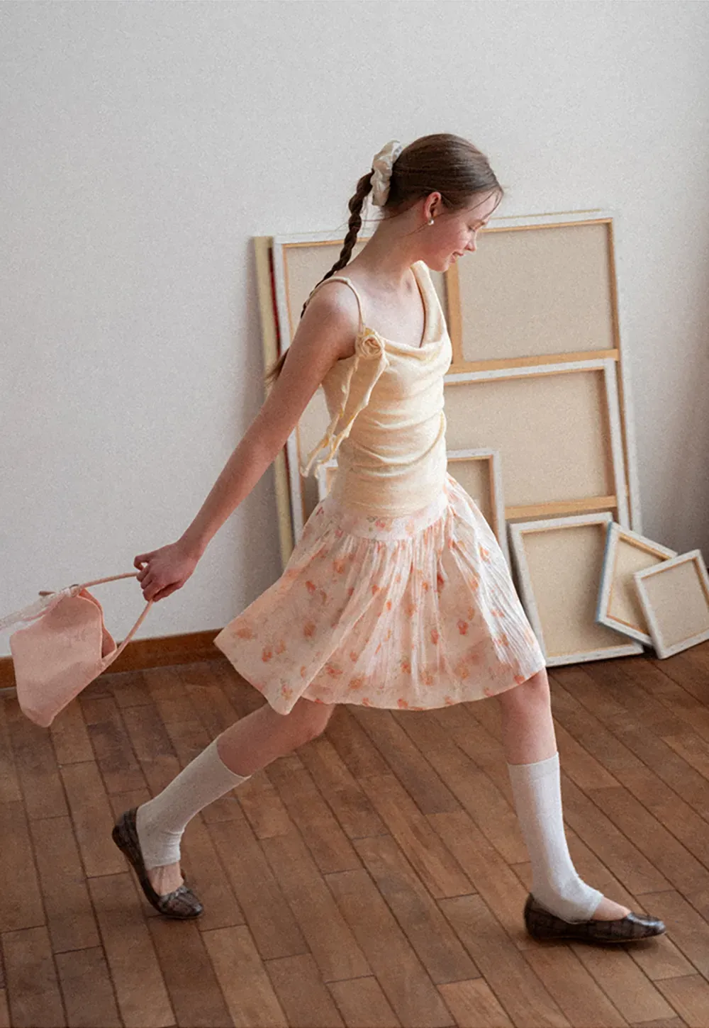 Asymmetrical draped tank top with tie detail