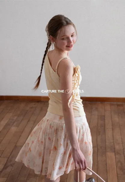 Asymmetrical draped tank top with tie detail