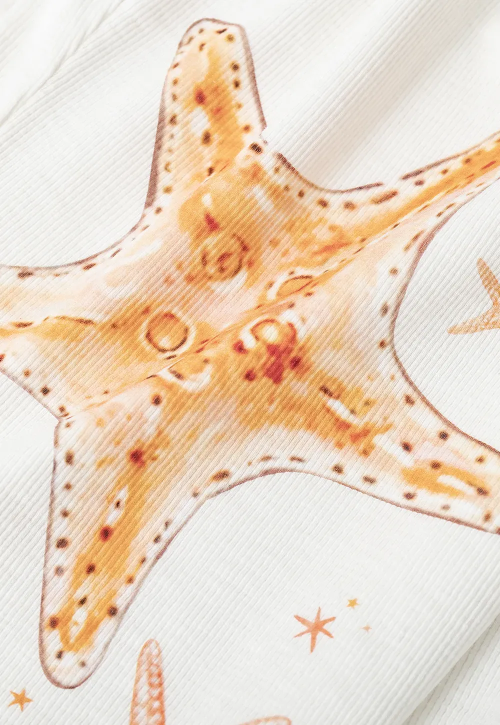 White tank top with starfish print design