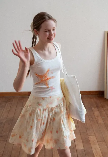 White tank top with starfish print design