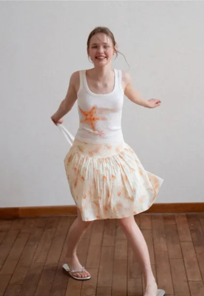 White tank top with starfish print design