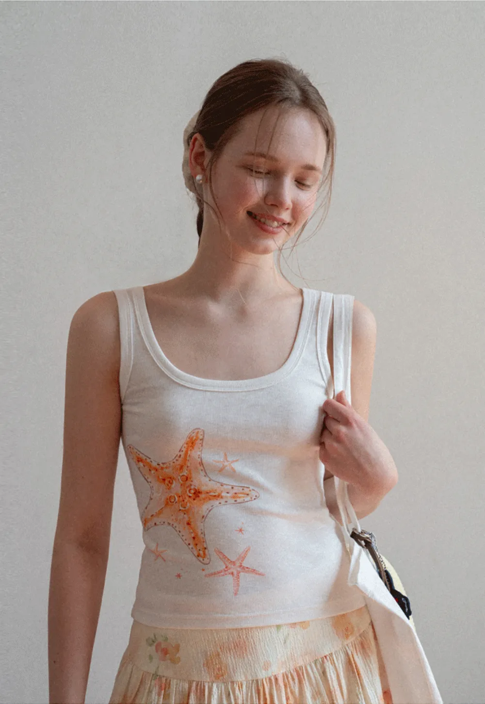 White tank top with starfish print design