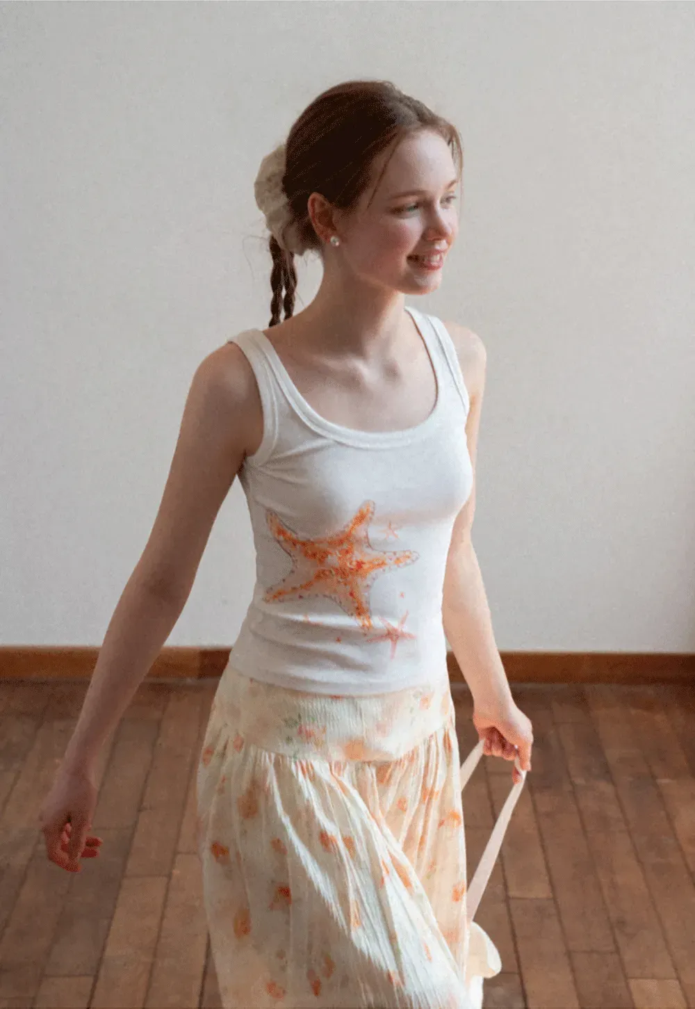 White tank top with starfish print design