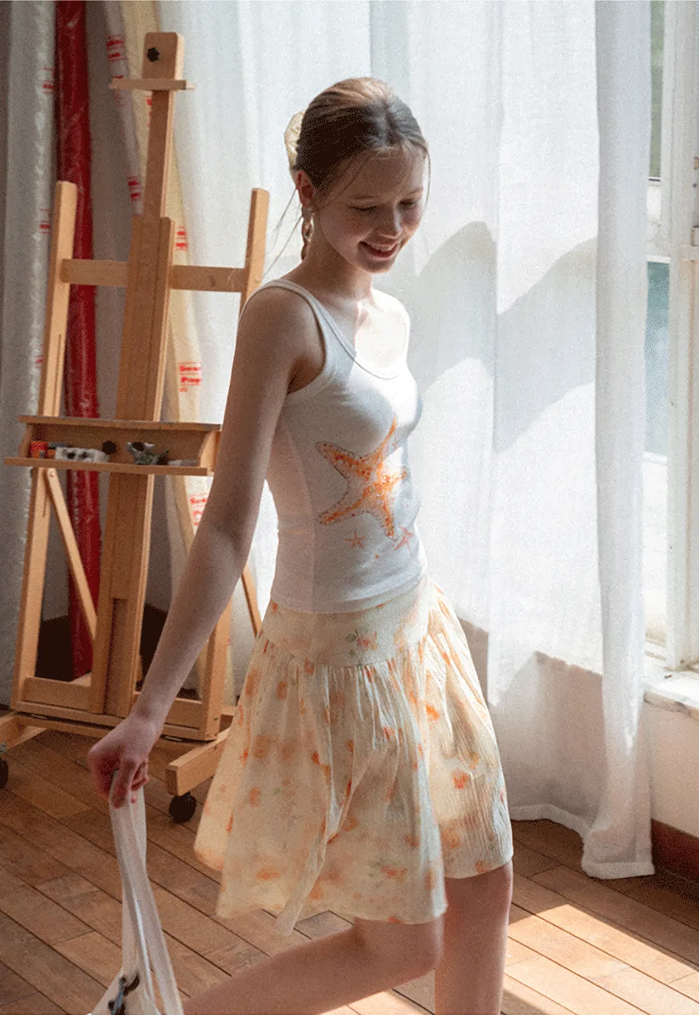 White tank top with starfish print design