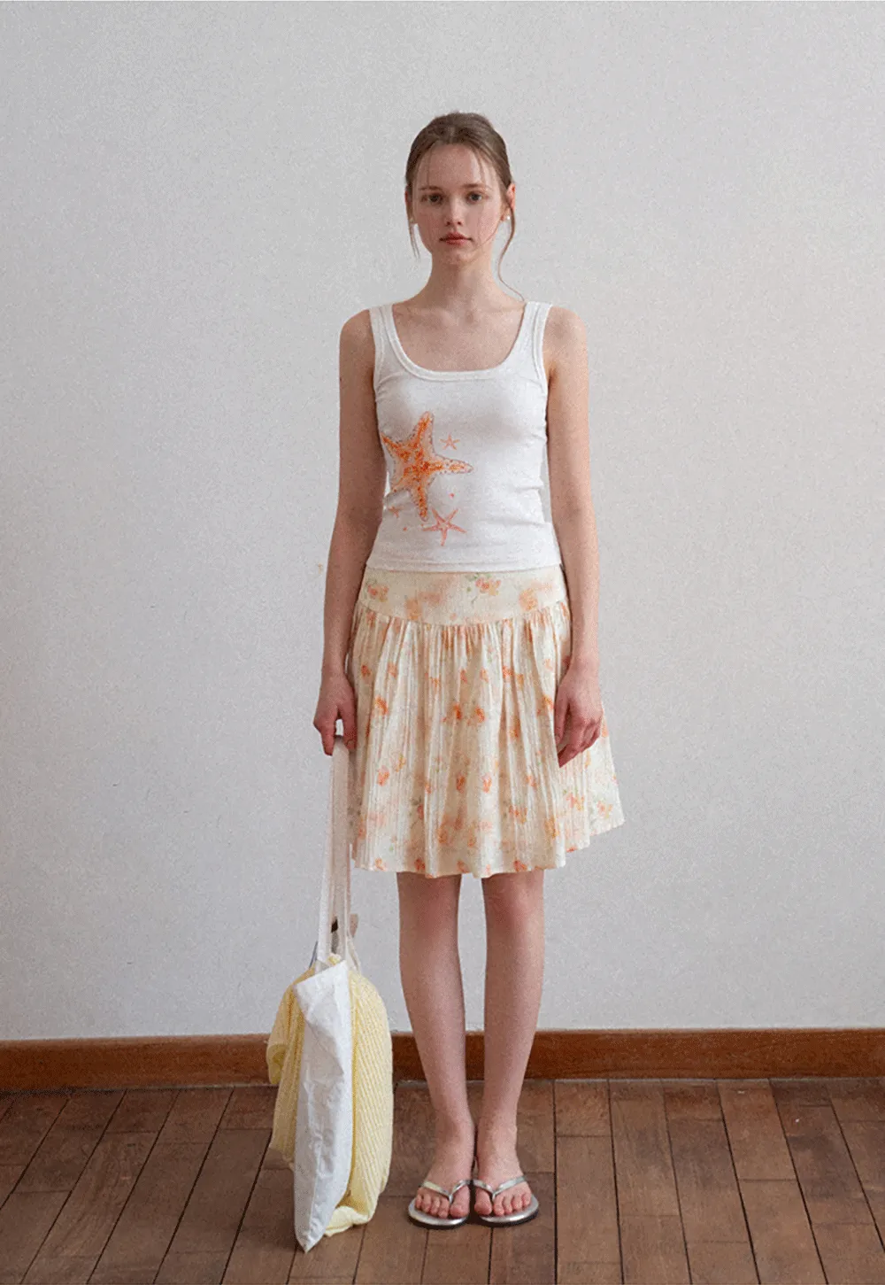 White tank top with starfish print design