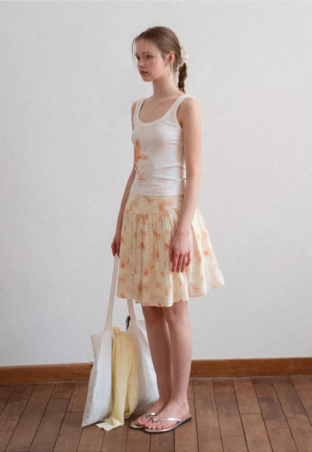 White tank top with starfish print design