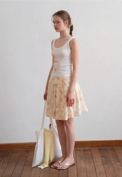 White tank top with starfish print design