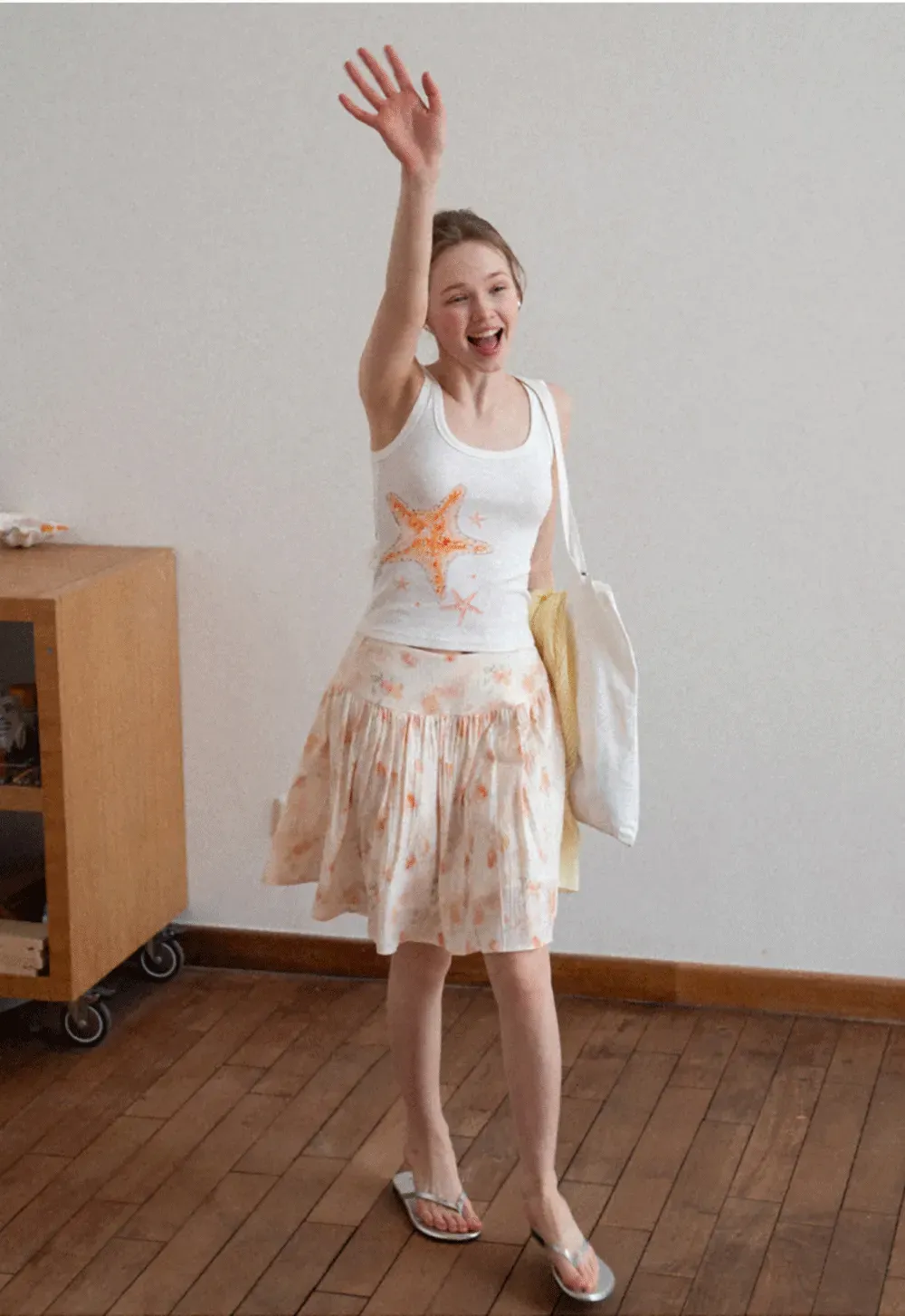 White tank top with starfish print design