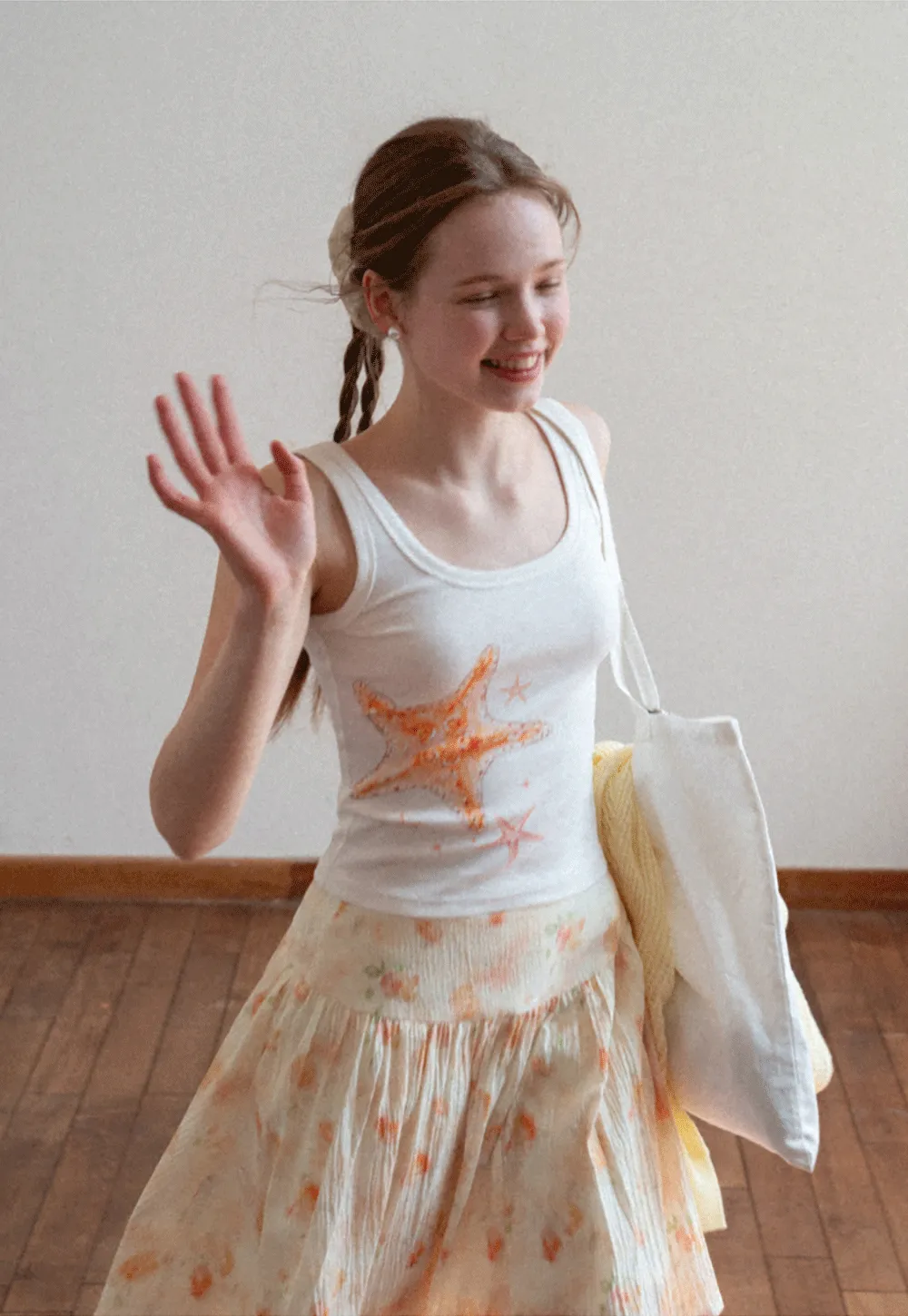 White tank top with starfish print design