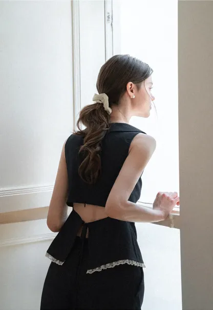 Cropped Sleeveless Top With Open Back Detail And High Waist Wide Leg Pants