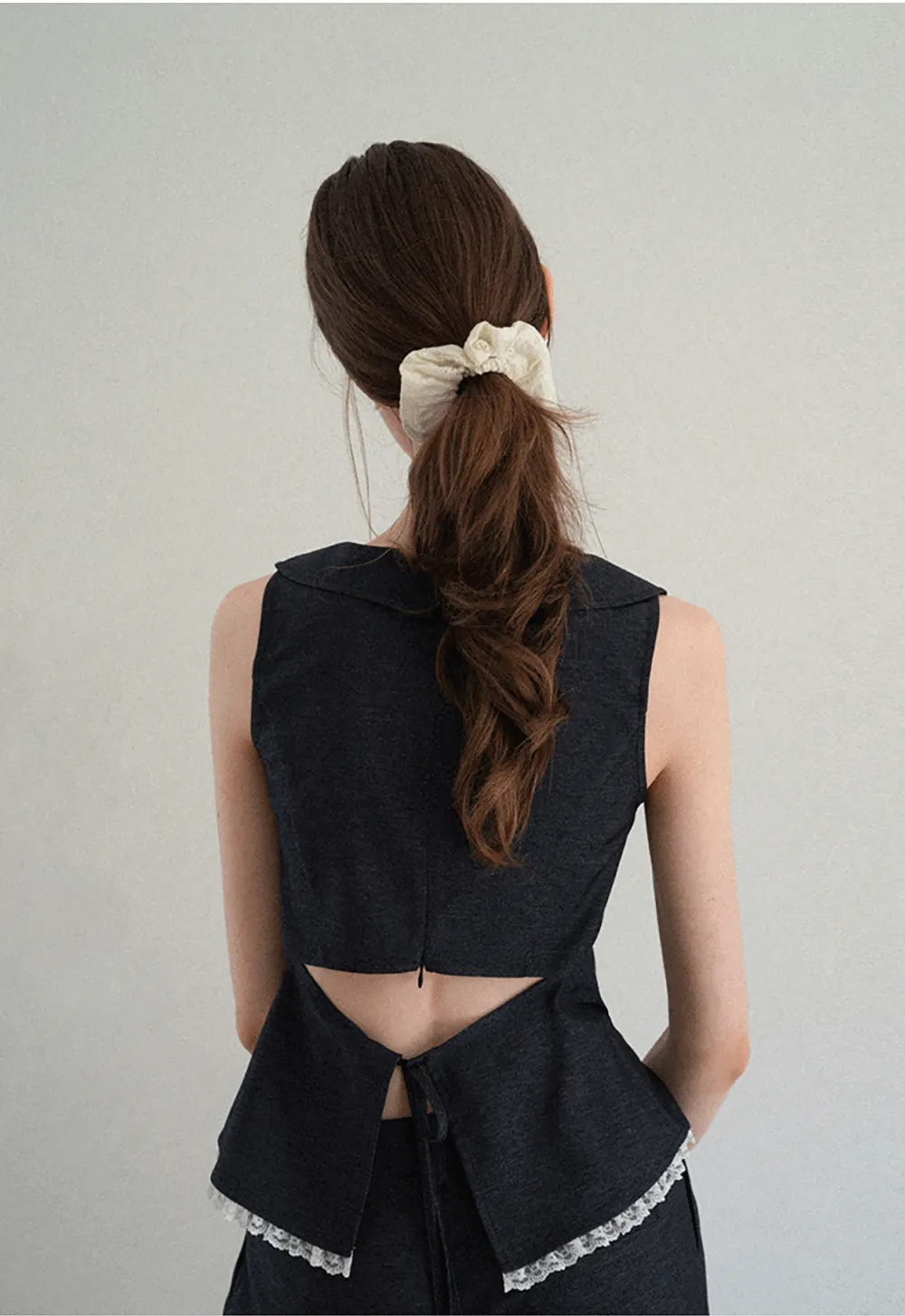 Cropped Sleeveless Top With Open Back Detail And High Waist Wide Leg Pants