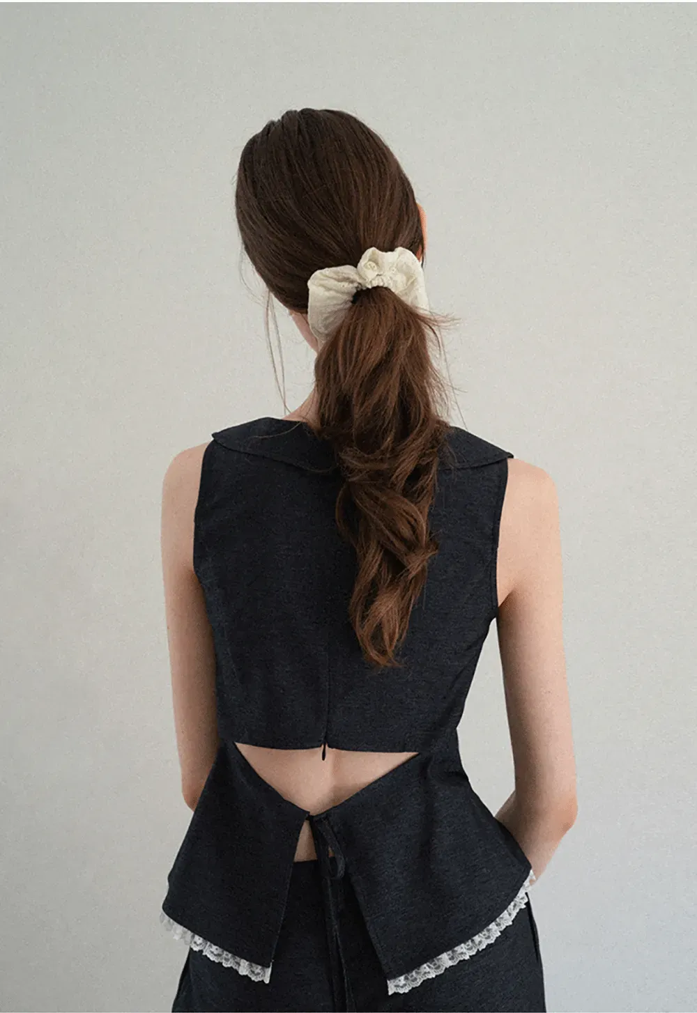 Cropped Sleeveless Top With Open Back Detail And High Waist Wide Leg Pants