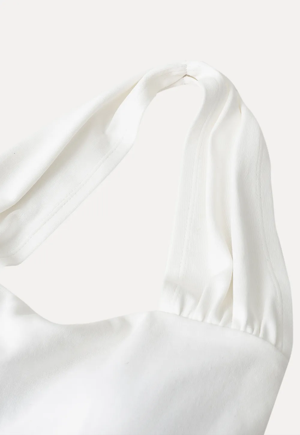 Halter neck tank top with ruffled hem