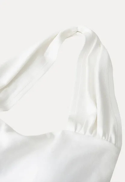 Halter neck tank top with ruffled hem