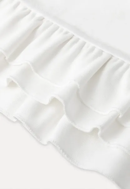 Halter neck tank top with ruffled hem