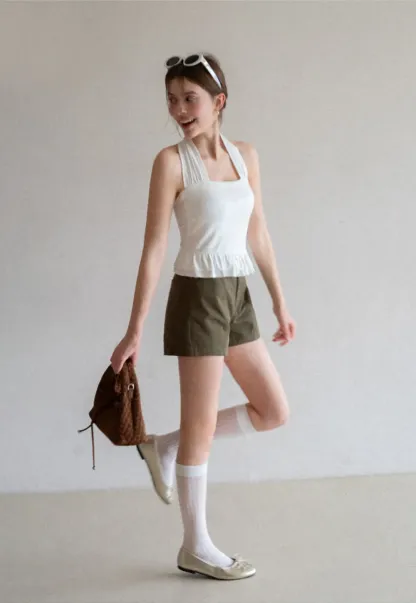 Halter neck tank top with ruffled hem