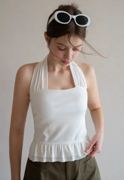 Halter neck tank top with ruffled hem