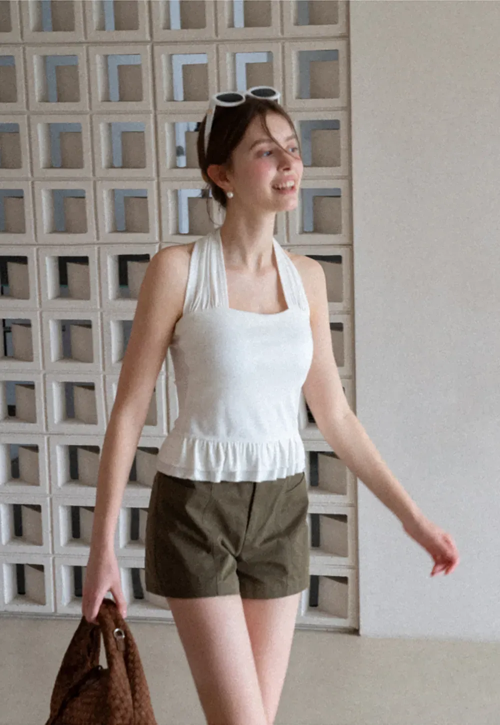 Halter neck tank top with ruffled hem