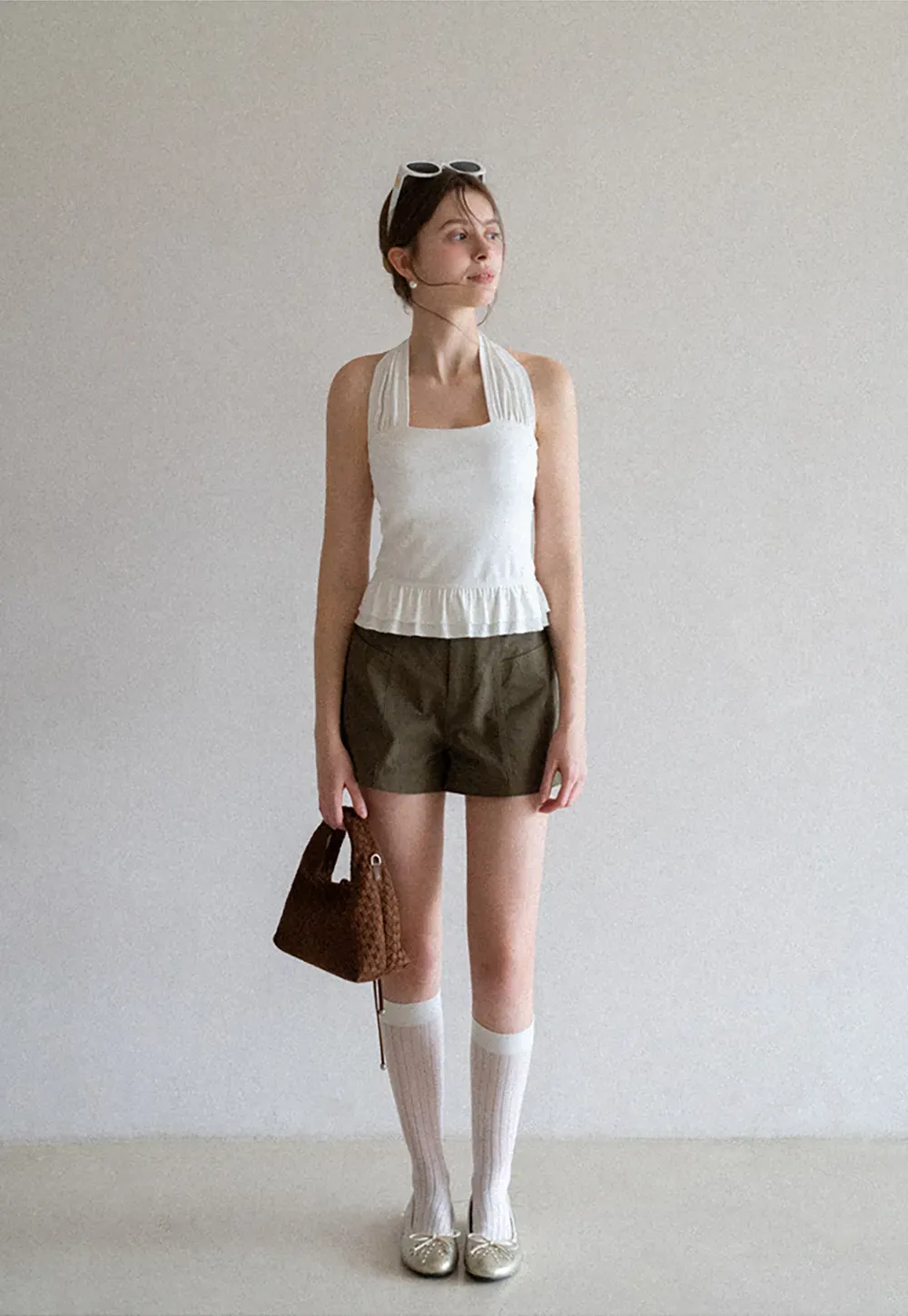 Halter neck tank top with ruffled hem