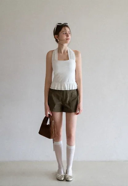 Halter neck tank top with ruffled hem