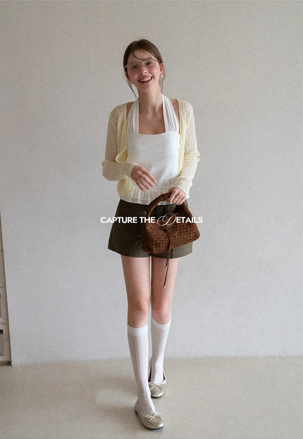 Halter neck tank top with ruffled hem