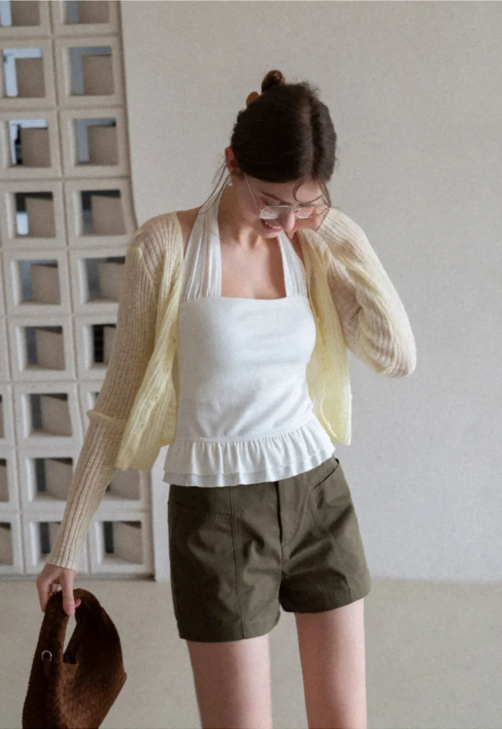 Halter neck tank top with ruffled hem