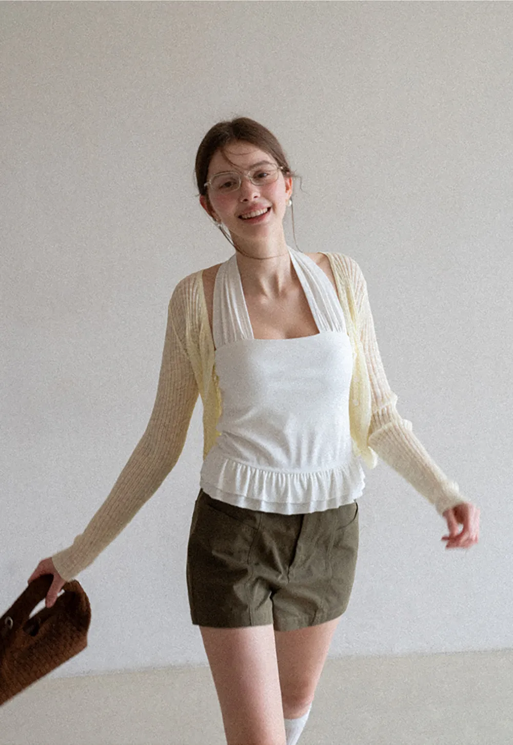 Halter neck tank top with ruffled hem