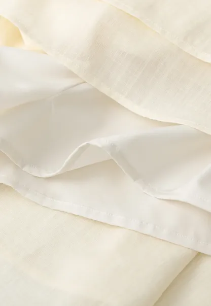 Halter neck top with layered ruffled skirt