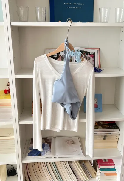 Crop tank top with halter neckline and thin straps