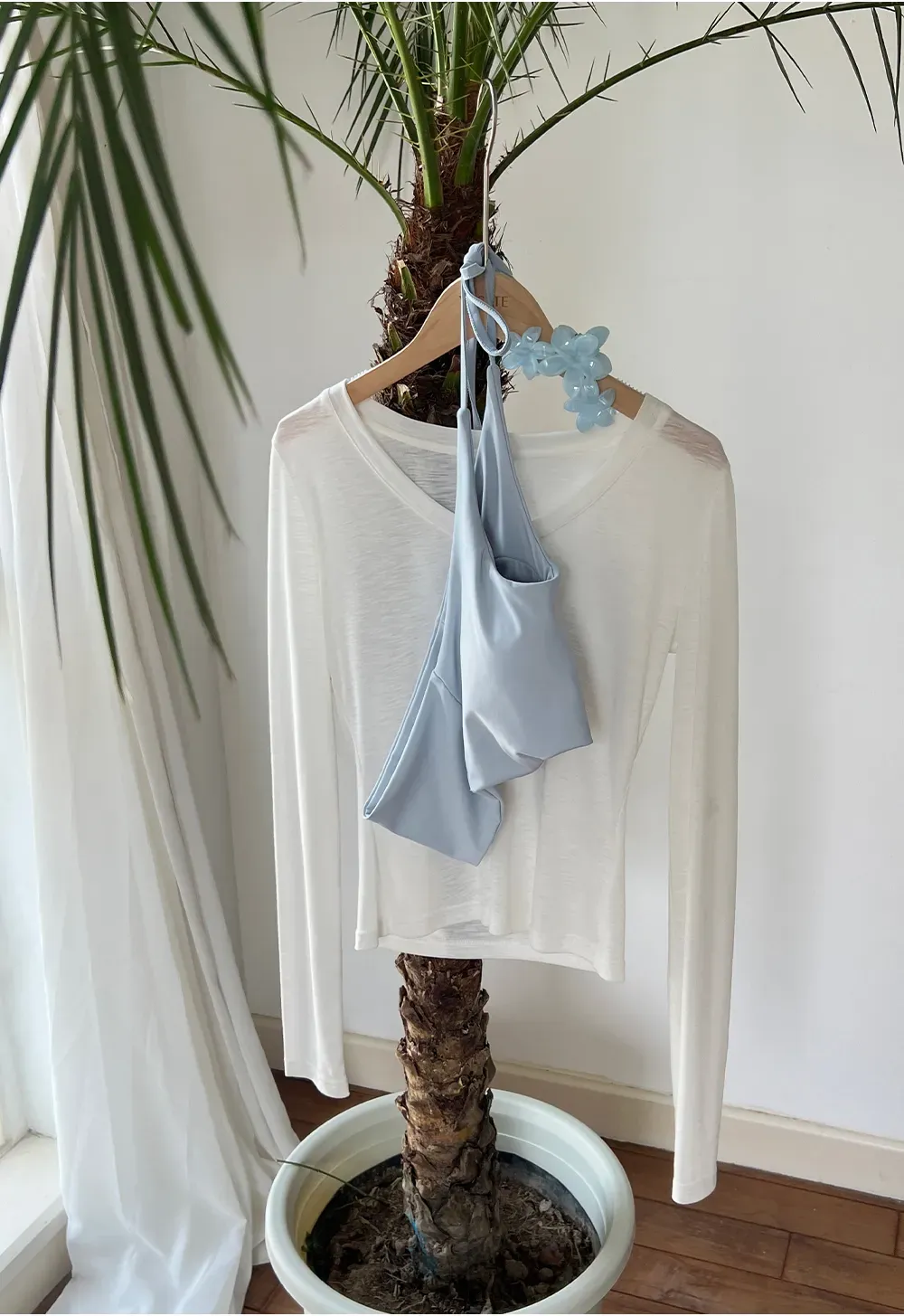 Crop tank top with halter neckline and thin straps