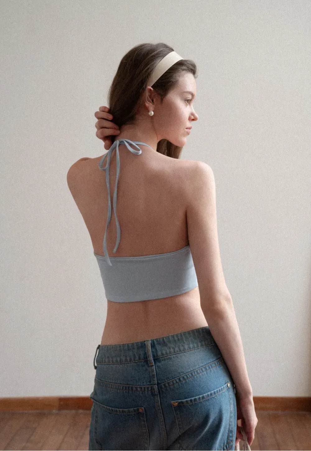 Crop tank top with halter neckline and thin straps